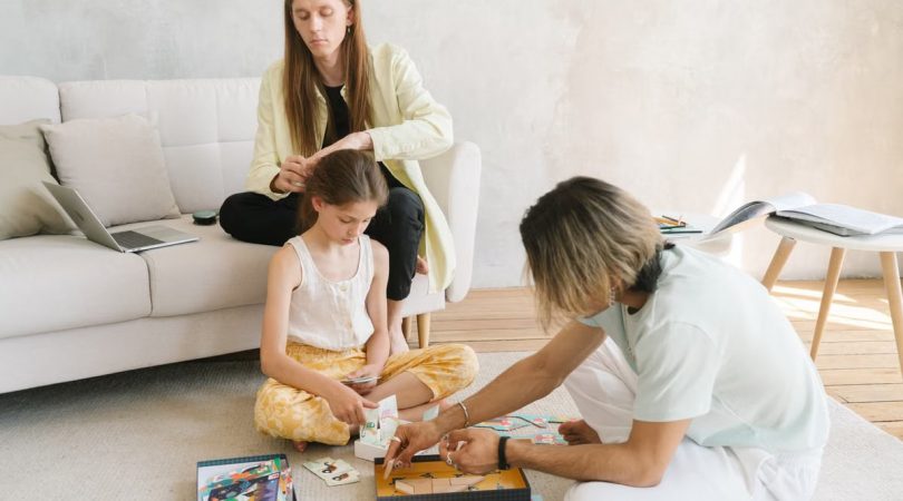 Family enjoying quality time together with board games, enhancing bonds and fun.